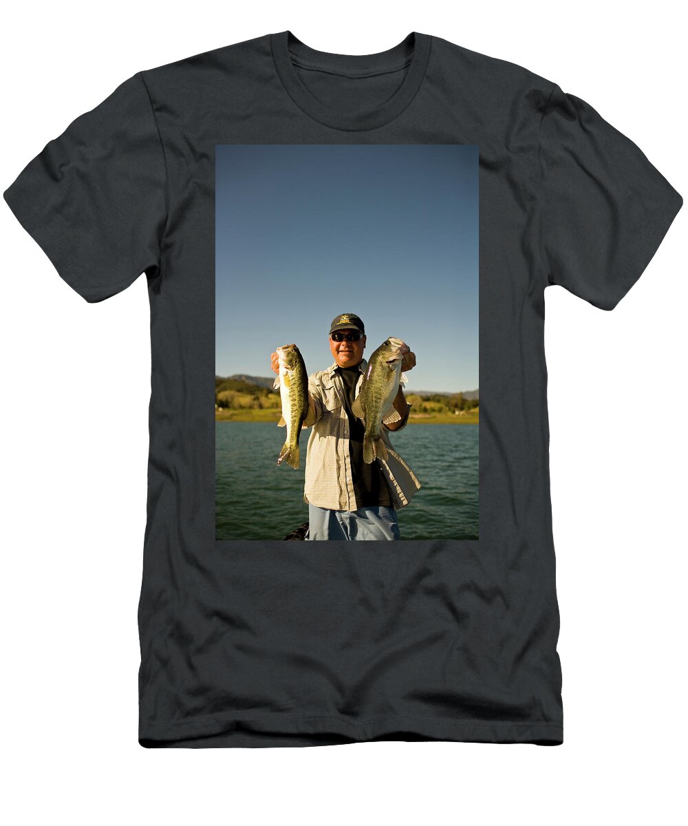 3 a Man Holds Up His Catch Proudly Jay Reilly T-Shirt