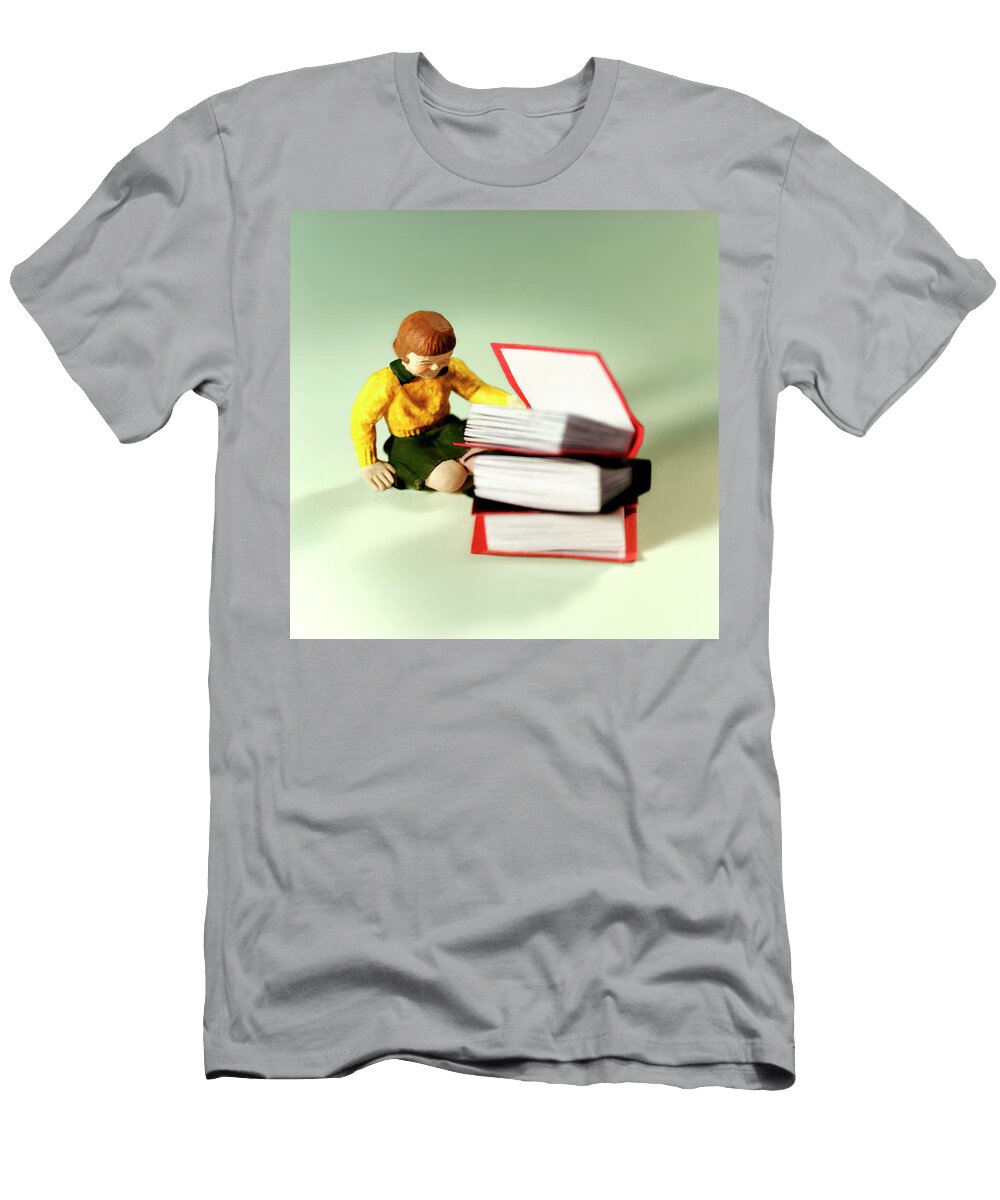 Girl Sitting Next to Three Large Books Csa Images T-Shirt